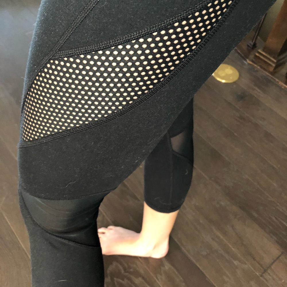 Black crop workout leggings with sheer details